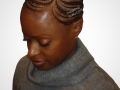 Biggie Small starburst Feed-In cornrows - Side Bun - Left Side View - Braids by Thebraidguru.com
