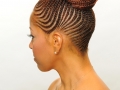 Feed-In Cornrows in a bun- Left Side View Braids by Thebraidguru.com