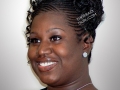 Feed-In Cornrows with Individuals - Curled and pinned up - Front Side View Braids by Thebraidguru.com